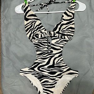 Wet Seal. Zebra. Size Medium. One Piece with Cut Outs.